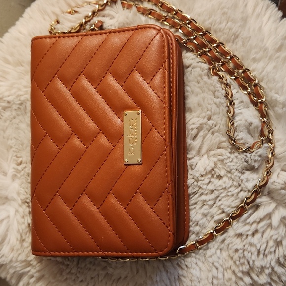 bebe Handbags - Bebe quilted bag with Gold rope chain cross body bag. Gently Used